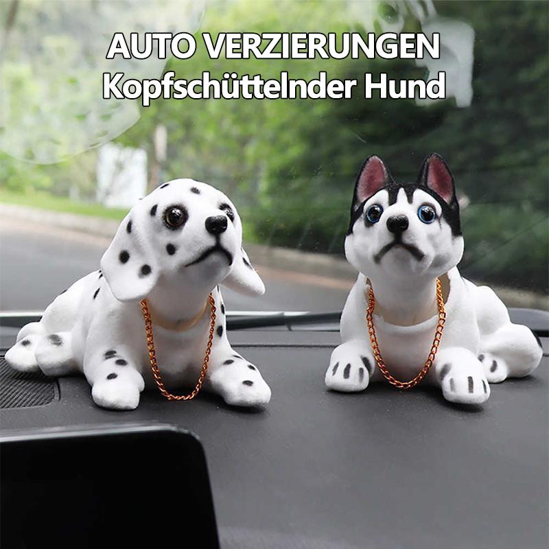 Autoverzierungen die seinen Kopfhund schütteln